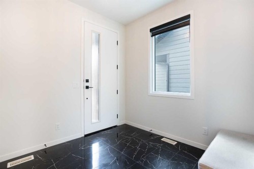 206 Rowley Way Nw, Calgary, AB - Indoor Photo Showing Other Room