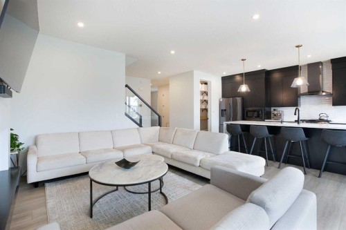 206 Rowley Way Nw, Calgary, AB - Indoor Photo Showing Living Room