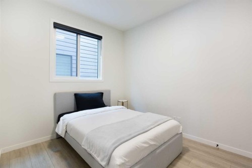 206 Rowley Way Nw, Calgary, AB - Indoor Photo Showing Bedroom