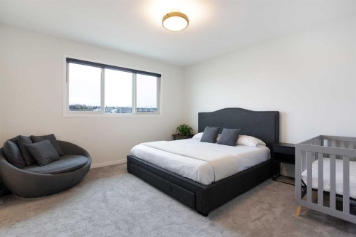 206 Rowley Way Nw, Calgary, AB - Indoor Photo Showing Bedroom