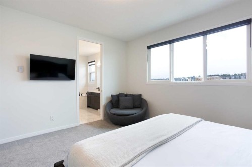 206 Rowley Way Nw, Calgary, AB - Indoor Photo Showing Bedroom