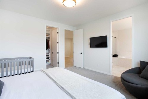 206 Rowley Way Nw, Calgary, AB - Indoor Photo Showing Bedroom