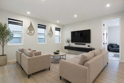 206 Rowley Way Nw, Calgary, AB - Indoor Photo Showing Living Room