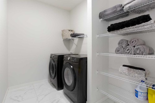 206 Rowley Way Nw, Calgary, AB - Indoor Photo Showing Laundry Room