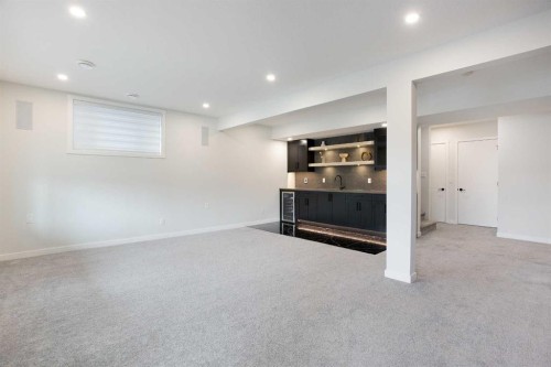206 Rowley Way Nw, Calgary, AB - Indoor Photo Showing Basement