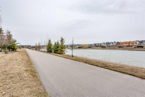 206 Rowley Way Nw, Calgary, AB - Outdoor With Body Of Water With View