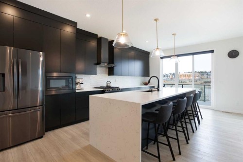 206 Rowley Way Nw, Calgary, AB - Indoor Photo Showing Kitchen With Upgraded Kitchen