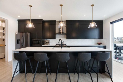 206 Rowley Way Nw, Calgary, AB - Indoor Photo Showing Kitchen With Upgraded Kitchen