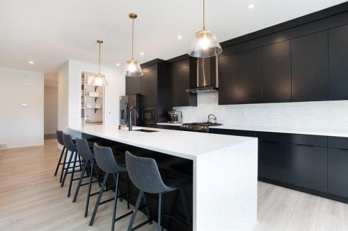 206 Rowley Way Nw, Calgary, AB - Indoor Photo Showing Kitchen With Upgraded Kitchen