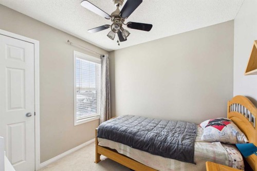 216 Covepark Green Ne, Calgary, AB - Indoor Photo Showing Bedroom