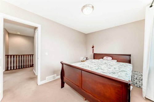 264 Everwillow Green Sw, Calgary, AB - Indoor Photo Showing Bedroom