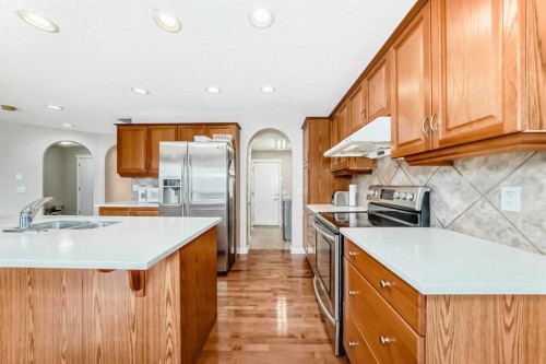264 Everwillow Green Sw, Calgary, AB - Indoor Photo Showing Kitchen With Double Sink