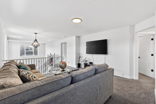 208 Dawson Circle, Chestermere, AB - Indoor Photo Showing Living Room