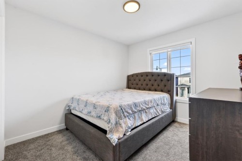 208 Dawson Circle, Chestermere, AB - Indoor Photo Showing Bedroom
