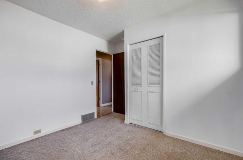 248 Huntcroft Road Ne, Calgary, AB - Indoor Photo Showing Other Room