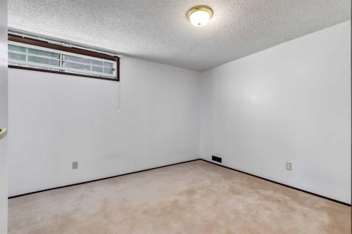 248 Huntcroft Road Ne, Calgary, AB - Indoor Photo Showing Other Room