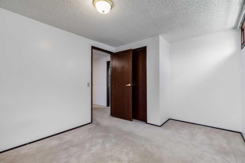 248 Huntcroft Road Ne, Calgary, AB - Indoor Photo Showing Other Room
