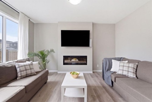 22 Carrington Crescent Nw, Calgary, AB - Indoor Photo Showing Living Room With Fireplace