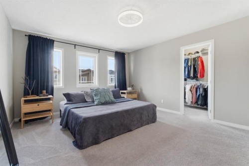 22 Carrington Crescent Nw, Calgary, AB - Indoor Photo Showing Bedroom