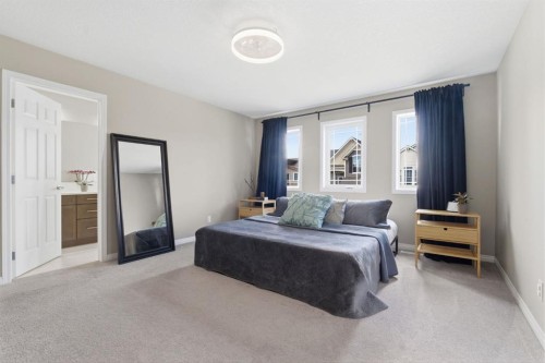 22 Carrington Crescent Nw, Calgary, AB - Indoor Photo Showing Bedroom