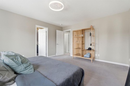 22 Carrington Crescent Nw, Calgary, AB - Indoor Photo Showing Bedroom