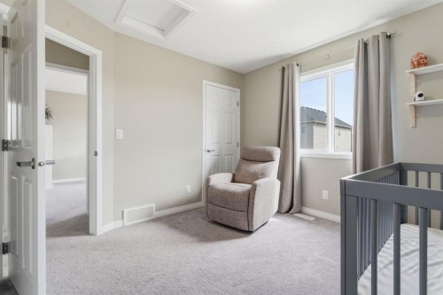 22 Carrington Crescent Nw, Calgary, AB - Indoor Photo Showing Bedroom