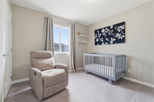 22 Carrington Crescent Nw, Calgary, AB - Indoor Photo Showing Bedroom