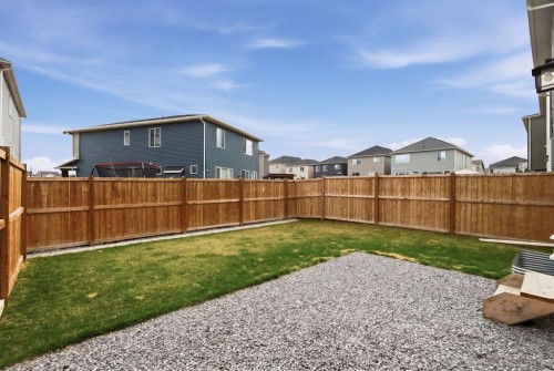 22 Carrington Crescent Nw, Calgary, AB - Outdoor With Backyard