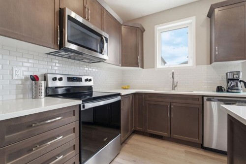 22 Carrington Crescent Nw, Calgary, AB - Indoor Photo Showing Kitchen With Stainless Steel Kitchen With Upgraded Kitchen