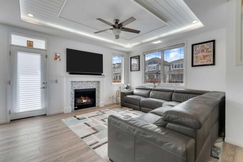 112 Cityside Terrace Ne, Calgary, AB - Indoor Photo Showing Living Room With Fireplace