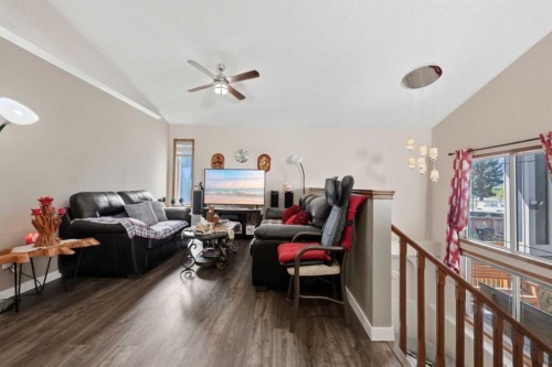 7 Chaparral Road Se, Calgary, AB - Indoor Photo Showing Living Room