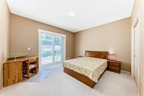 92 Hamptons Drive Nw, Calgary, AB - Indoor Photo Showing Bedroom