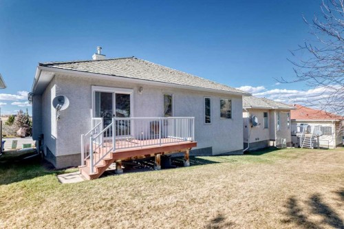 92 Hamptons Drive Nw, Calgary, AB - Outdoor With Deck Patio Veranda
