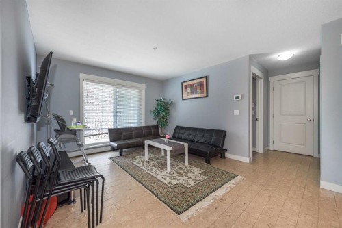 2207-155 Skyview Ranch Way Ne, Calgary, AB - Indoor Photo Showing Living Room