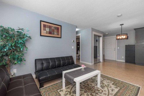 2207-155 Skyview Ranch Way Ne, Calgary, AB - Indoor Photo Showing Living Room