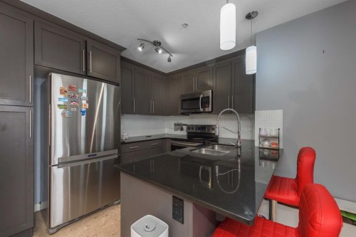 2207-155 Skyview Ranch Way Ne, Calgary, AB - Indoor Photo Showing Kitchen With Stainless Steel Kitchen With Double Sink With Upgraded Kitchen