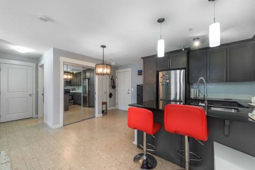 2207-155 Skyview Ranch Way Ne, Calgary, AB - Indoor Photo Showing Kitchen With Stainless Steel Kitchen With Double Sink With Upgraded Kitchen