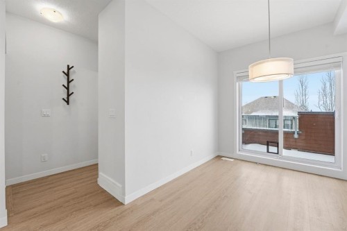 84 Shawnee Common Sw, Calgary, AB - Indoor Photo Showing Other Room