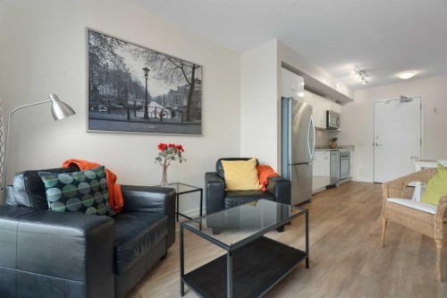 1503-450 8 Avenue Se, Calgary, AB - Indoor Photo Showing Living Room