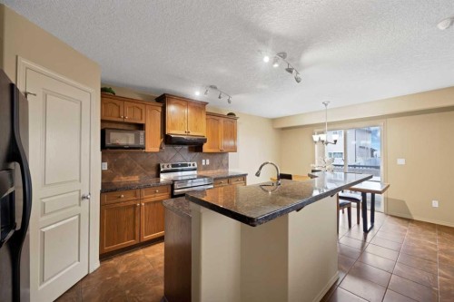 10 Bridlerange Circle Sw, Calgary, AB - Indoor Photo Showing Kitchen