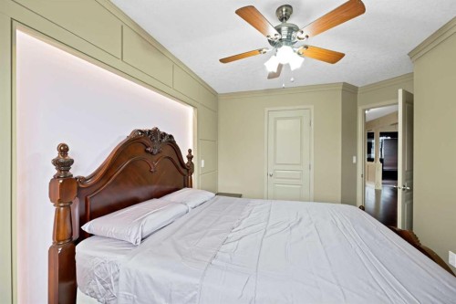 10 Bridlerange Circle Sw, Calgary, AB - Indoor Photo Showing Bedroom