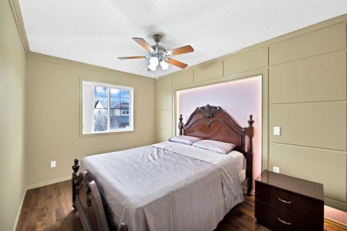 10 Bridlerange Circle Sw, Calgary, AB - Indoor Photo Showing Bedroom