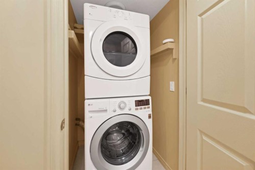 10 Bridlerange Circle Sw, Calgary, AB - Indoor Photo Showing Laundry Room