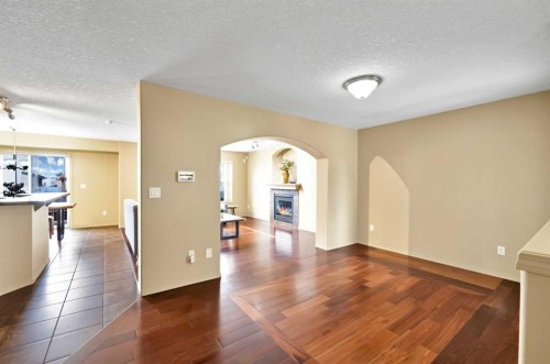 10 Bridlerange Circle Sw, Calgary, AB - Indoor With Fireplace