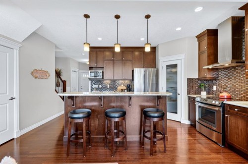 202 Evansridge Circle Nw, Calgary, AB - Indoor Photo Showing Kitchen With Stainless Steel Kitchen With Upgraded Kitchen