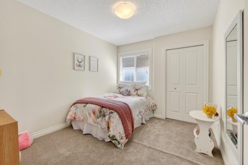 202 Evansridge Circle Nw, Calgary, AB - Indoor Photo Showing Bedroom