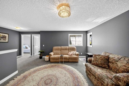 168 Cranford Drive Se, Calgary, AB - Indoor Photo Showing Living Room