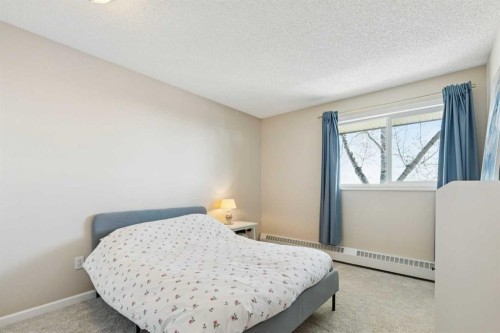 4308-385 Patterson Hill Sw, Calgary, AB - Indoor Photo Showing Bedroom