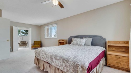 504 Suntree Place, Okotoks, AB - Indoor Photo Showing Bedroom