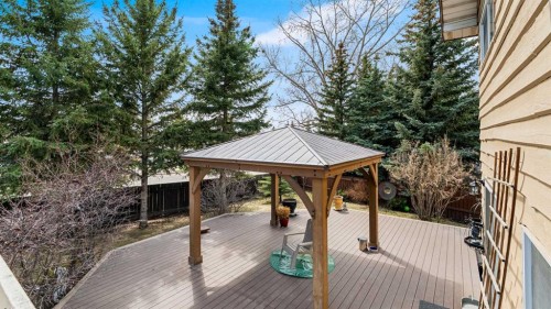 504 Suntree Place, Okotoks, AB - Outdoor With Deck Patio Veranda